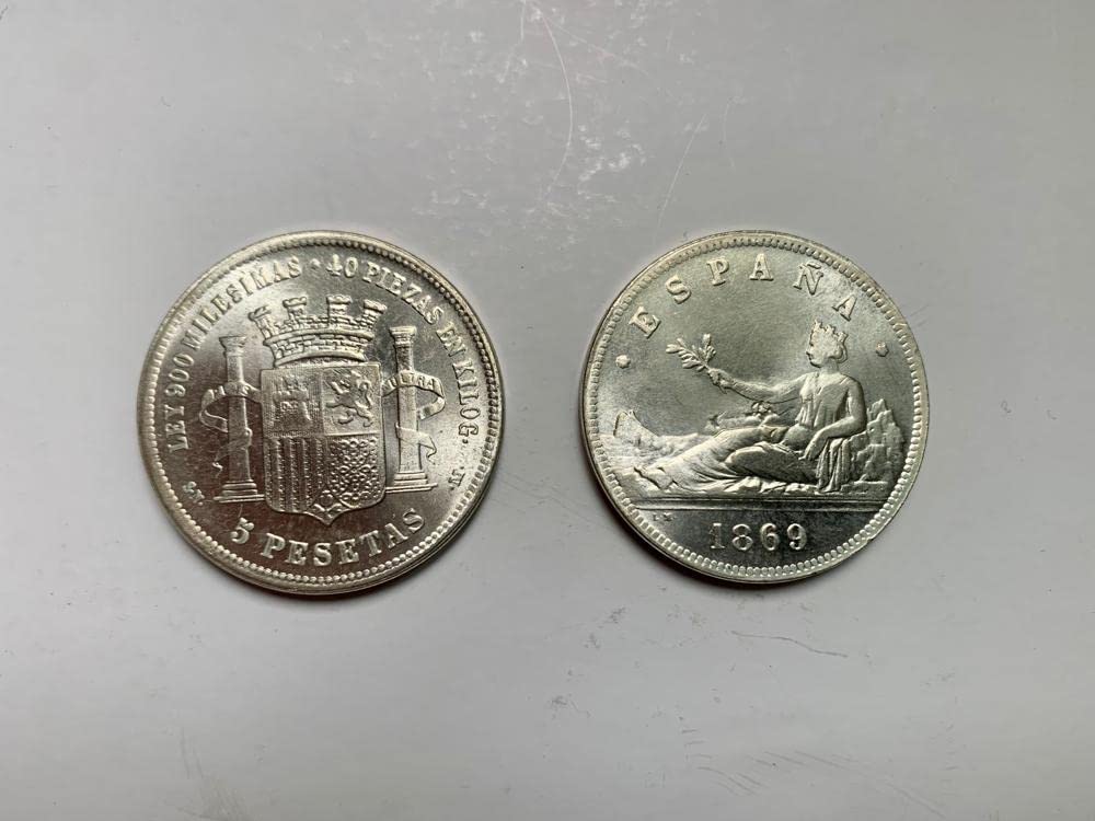 Quality replica of historical coin: Spain 5 Pesetas "Provisional Government" Quality replica of historical coin: Spain 5 Pesetas "Provisional Government" 1869. Made of brass and plated in silver.